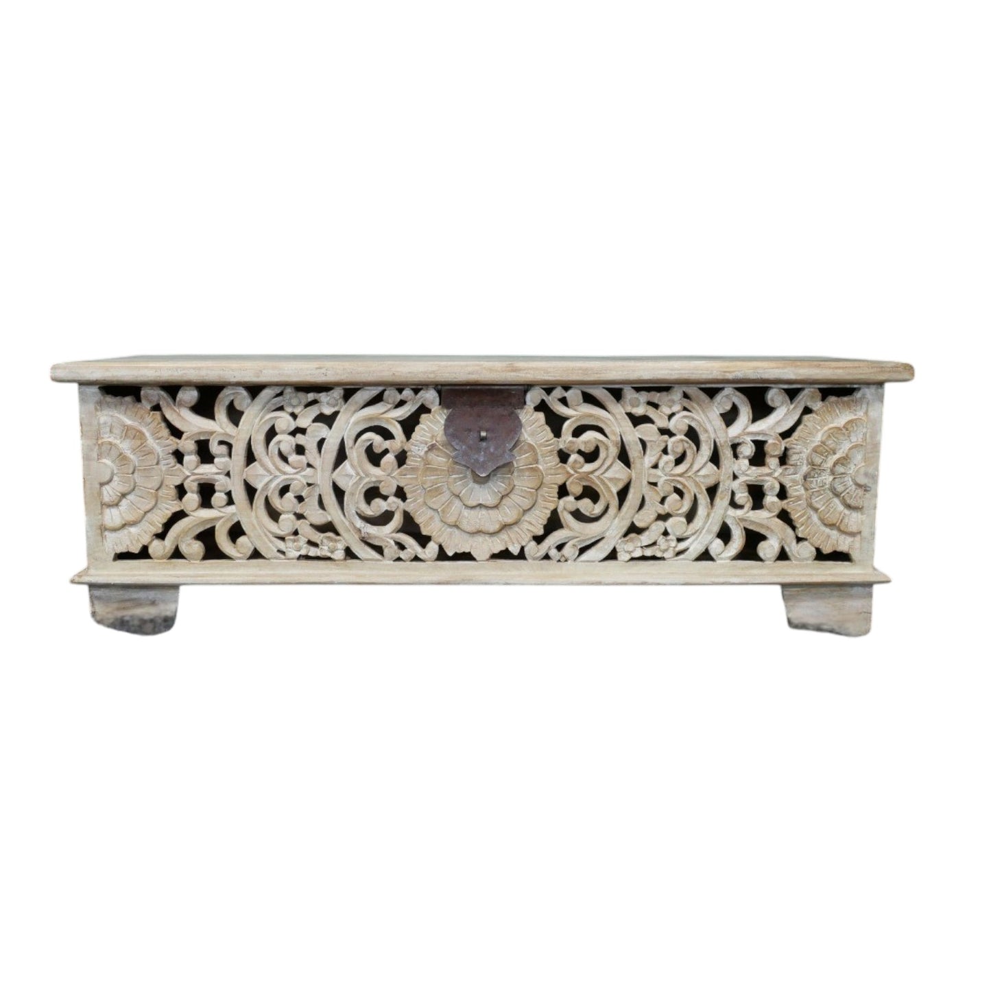 A handcrafted storage bench made from solid mango wood, measuring 135cm wide, 40cm deep, and 46cm high. The bench features a whitewashed finish and intricately carved floral and geometric patterns on its front panel. It includes a lift-up lid revealing a spacious internal compartment, offering both seating and storage solutions. The rustic design and boho craftsmanship make it suitable for various interior styles, including bohemian, farmhouse, and eclectic decors.