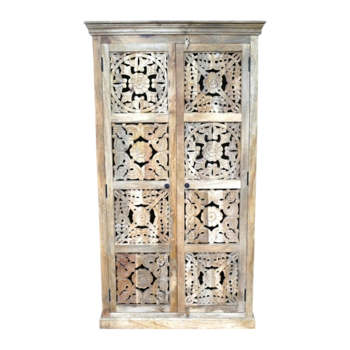 A tall, hand-carved solid mango wood cabinet measuring 180cm in height, 99cm in width, and 41cm in depth. The cabinet features two full-length doors adorned with intricate floral and geometric carvings, reflecting Eastern design influences. Finished in a natural wood tone, this piece offers ample internal storage with shelved compartments, making it both functional and decorative.
Suitable for various interior styles, including bohemian, rustic, and eclectic decors.