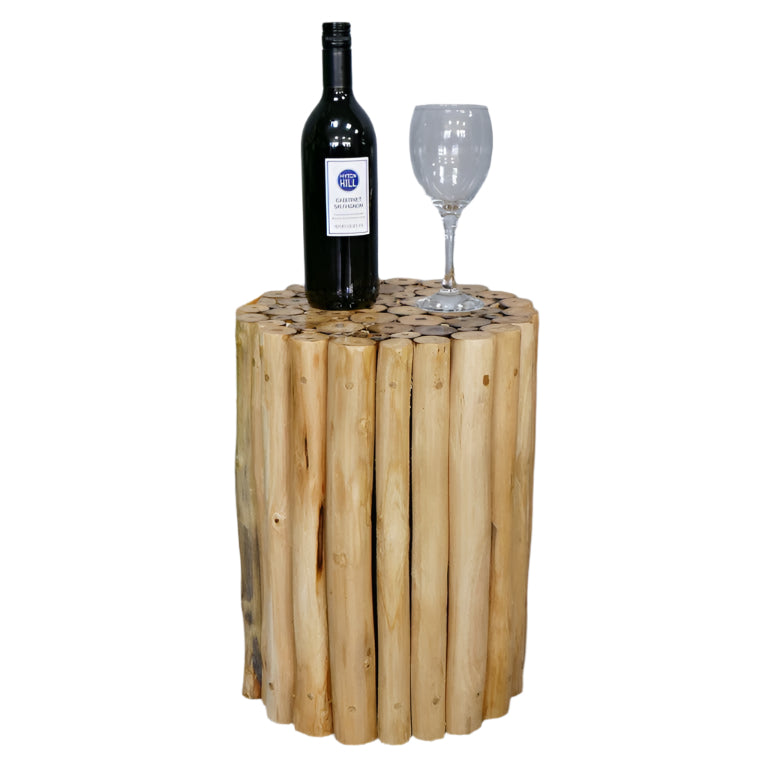 Crafted from natural teak wood, this Coastal Teak Side Table boldly celebrates natural beauty with its unique assembly of wooden tubes. Its raw, untouched finish brings an authentic rustic charm to any living space, and it can even double up as a stool. Perfect for those who dare to embrace a beach house vibe, this piece adds character and warmth.