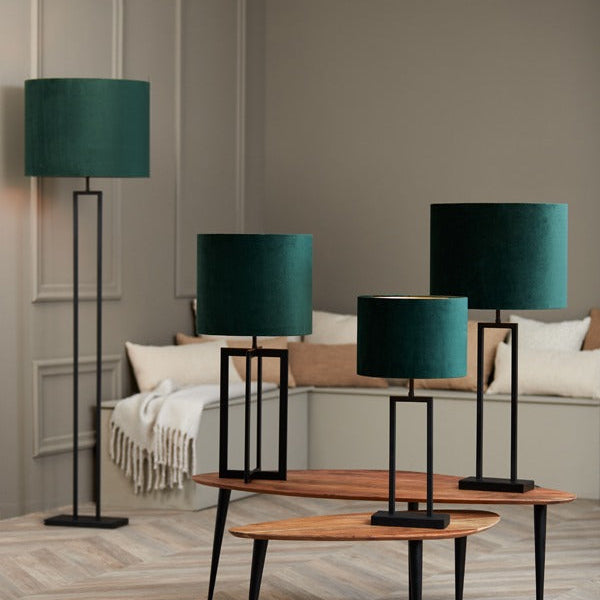 A velvet textured cylindrical lampshade in deep green, fitting an E27 bulb.