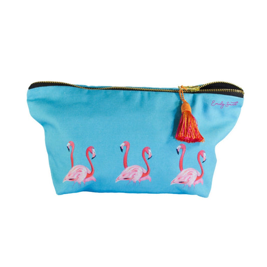Blue makeup bag with pink flamingo designs and a tassel on a white background