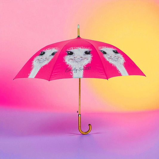 Pink umbrella with ostrich design on a gradient pink and yellow background