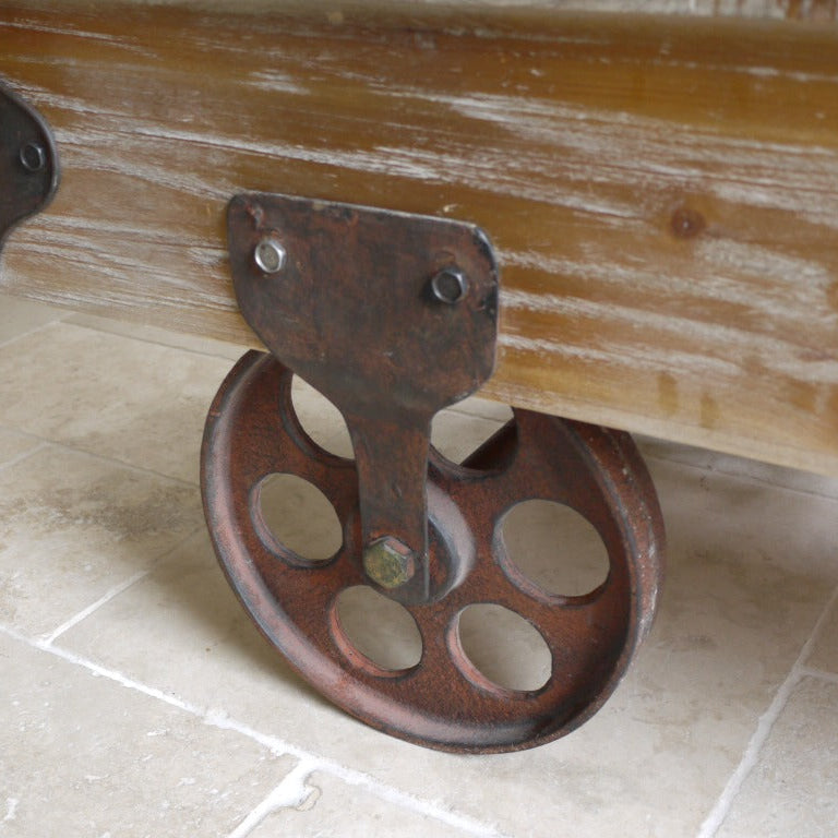This bold French Railway Style Coffee Table commands attention with its charming, rustic presence. Made of reclaimed wood and adorned with vintage wine crate lettering, it blends tradition with a fun flair. Iron accents and four sturdy wheels enhance its rustic industrial charm, making it a striking centrepiece that transforms any living room into a stylish statement space!