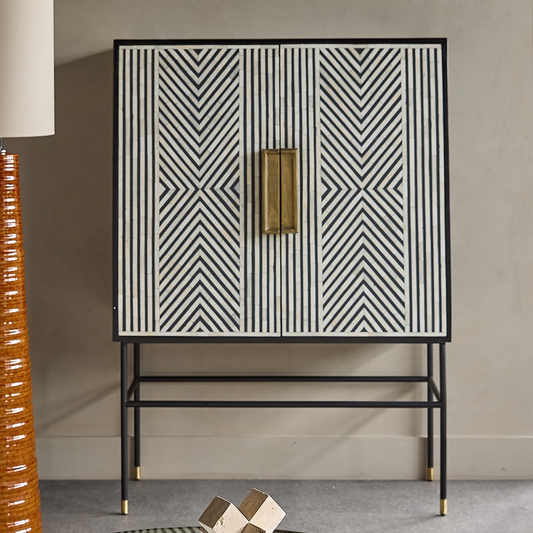 Modern cabinet with geometric pattern in a room setting