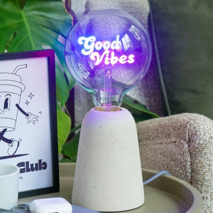 Pink and Blue filament bulb with 'Good Vibes' text