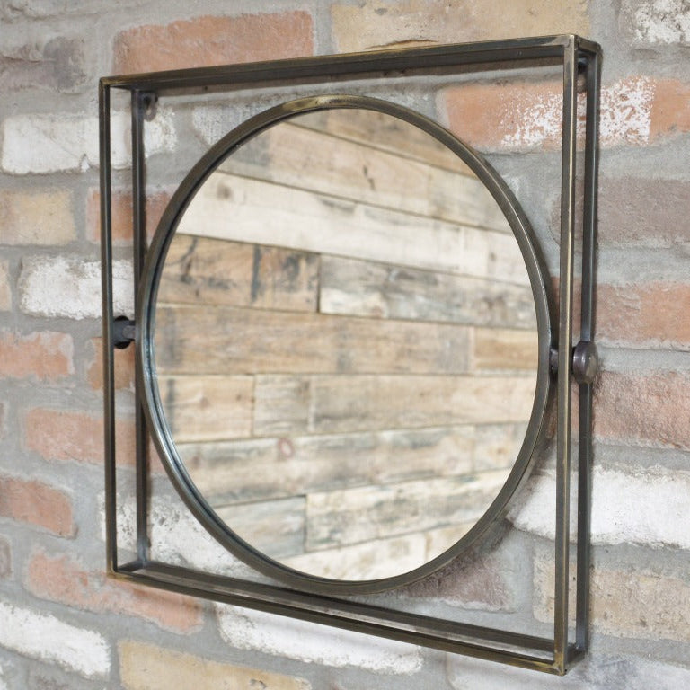 Make a bold statement with this Industrial Framed Wall Mirror. Its unique distressed bronze finish and striking circular mirror set inside a square frame deliver a daring, weathered industrial vibe that transforms any room into a standout space.