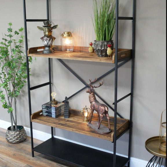 Tall industrial-style shelving unit measuring 200cm in height, 110cm in width, and 40cm in depth. Constructed with a sturdy black iron frame and five spacious reclaimed wood shelves, the unit showcases a blend of rustic and industrial aesthetics. The natural wood finish highlights the unique grain patterns, while the metal framework provides durability and a contemporary edge. This versatile piece complements various interior styles, including industrial, rustic, and modern farmhouse decor styles.