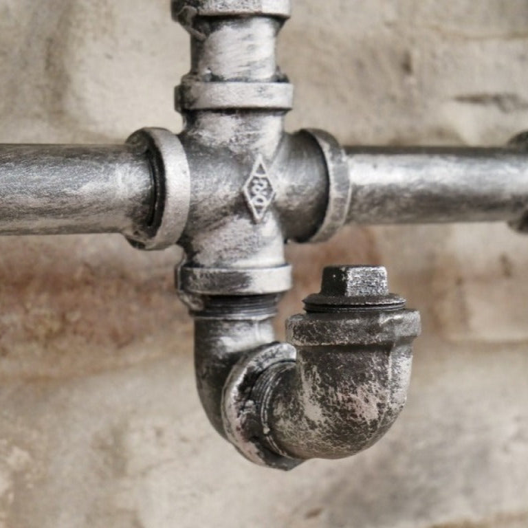 Crafted from genuine steel, this Industrial Pipe Coat Hook set injects a bold steampunk vibe into any space. With five sturdy hooks, they offer practical storage while transforming your walls with an edgy, industrial flair. Perfect for those who dare to redefine their home decor and want to say goodbye to boring coat organisation!