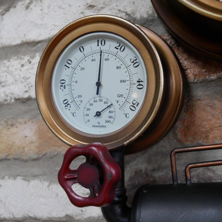 Introduce a daring industrial flair to your space with the Steampunk Pipe Wall Clock. Crafted to evoke vintage machinery, its bold design transforms any room into a conversation starter. This striking clock blends industrial charm with artistic edge, making your home decor truly unforgettable.