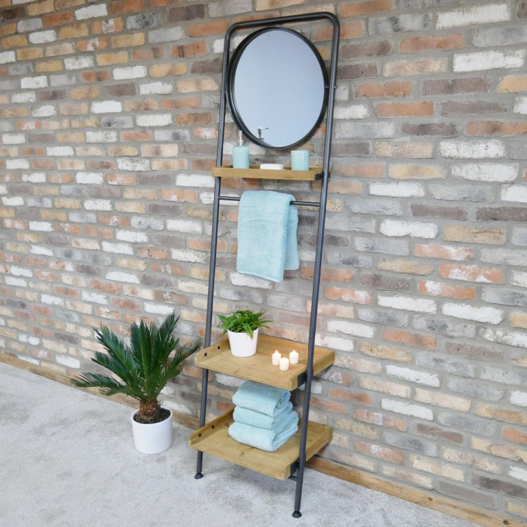 Add a warm, industrial touch to your space with this Industrial Leaning Mirror Shelf. Crafted from reclaimed wood, featuring three shelves and a hanging rail. Its rustic charm and natural imperfections bring character to any room, whether in your study, bathroom, or bedroom. This versatile piece combines practical storage with stylish design, helping you keep your essentials organised and within easy reach!