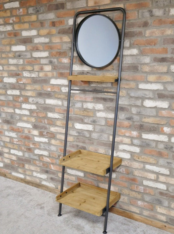Add a warm, industrial touch to your space with this Industrial Leaning Mirror Shelf. Crafted from reclaimed wood, featuring three shelves and a hanging rail. Its rustic charm and natural imperfections bring character to any room, whether in your study, bathroom, or bedroom. This versatile piece combines practical storage with stylish design, helping you keep your essentials organised and within easy reach!