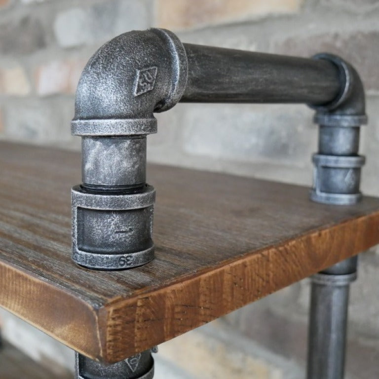 Elevate your space with the bold Industrial Pipe Shelving Unit, where rugged steel pipes meet warm, rustic wooden shelves. Standing 176cm tall, this striking piece commands attention while offering support and generous storage! Add a modern, robust twist to your home decor style!