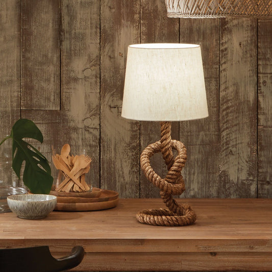 Nautical rope table lamp featuring a twisted natural rope base and a soft white cotton lampshade, perfect for coastal, rustic, or boho home decor.