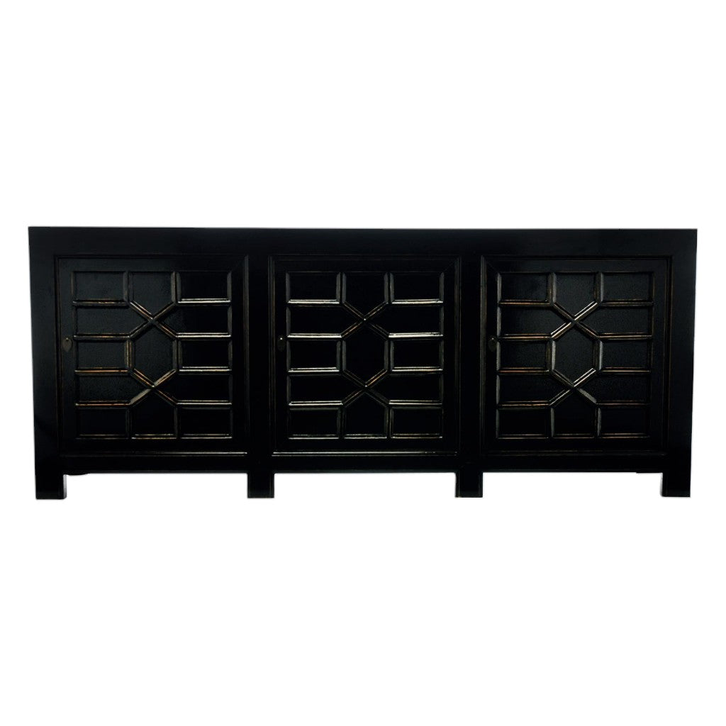 Make a bold statement with the Oriental Black Wood Sideboard. Its large, luxurious design combines classic Eastern style with practical storage, featuring three spacious doors to keep your essentials neatly tucked away. This striking piece transforms any room into a sophisticated sanctuary, adding an exclusive touch of daring elegance to your home.