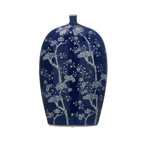 Elevate your space with the exquisite Oriental Blue Blossom Ceramic Vase. Its deep blue glaze and delicate white blossom branches create a striking contrast that commands attention. The slender neck and gracefully curved silhouette channel classic Chinoiserie elegance, making it a bold statement piece or a captivating addition to your curated collection. Bring a touch of Far Eastern sophistication to any room.