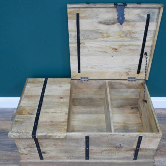 Embrace rustic style with this Rustic Wood Wine Trunk, which provides both a surface to place your favourite items on, and storage for your favourite bottles. Its rugged charm is amplified by an integrated wine rack in a crate design, perfect for showcasing your favourite bottles with flair. The spacious trunk compartment offers ample hidden storage, keeping your space effortlessly organised! Ideal for rustic, boho and coastal spaces.