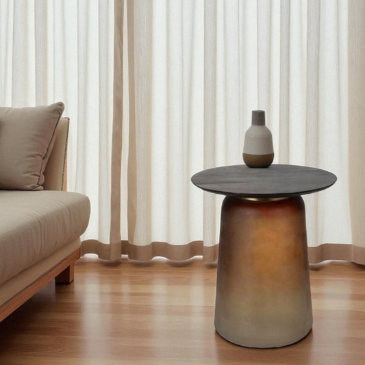 Modern side table with a vase in a living room setting