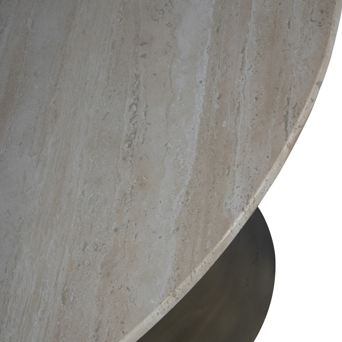 Close-up of a travertine table top with natural patterns