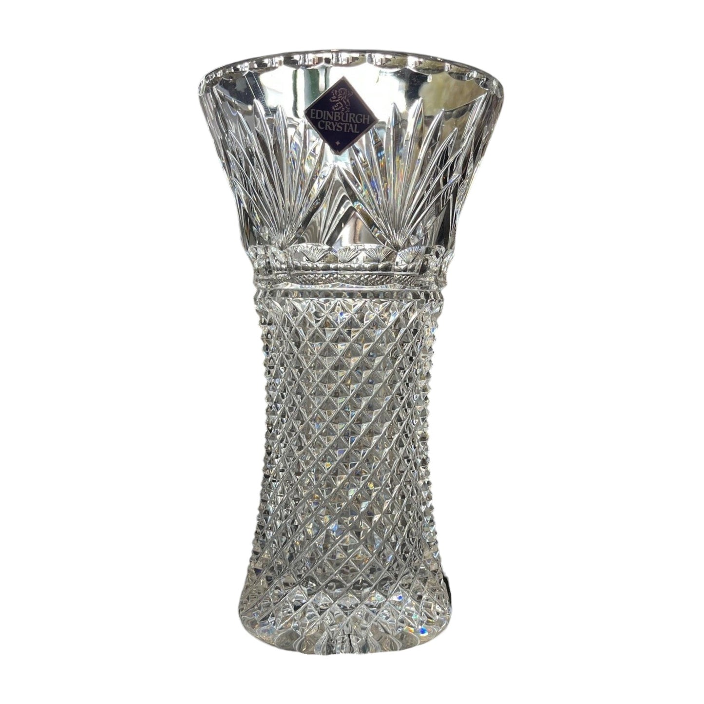 Crystal vase with intricate design on a white background