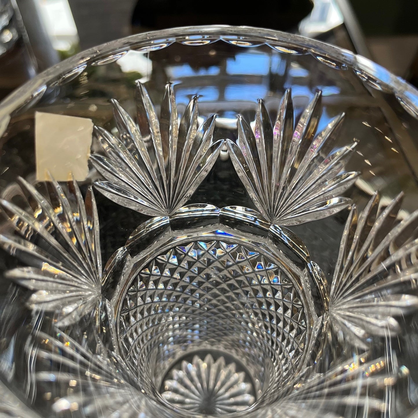 Close-up of a crystal glass with intricate cut patterns