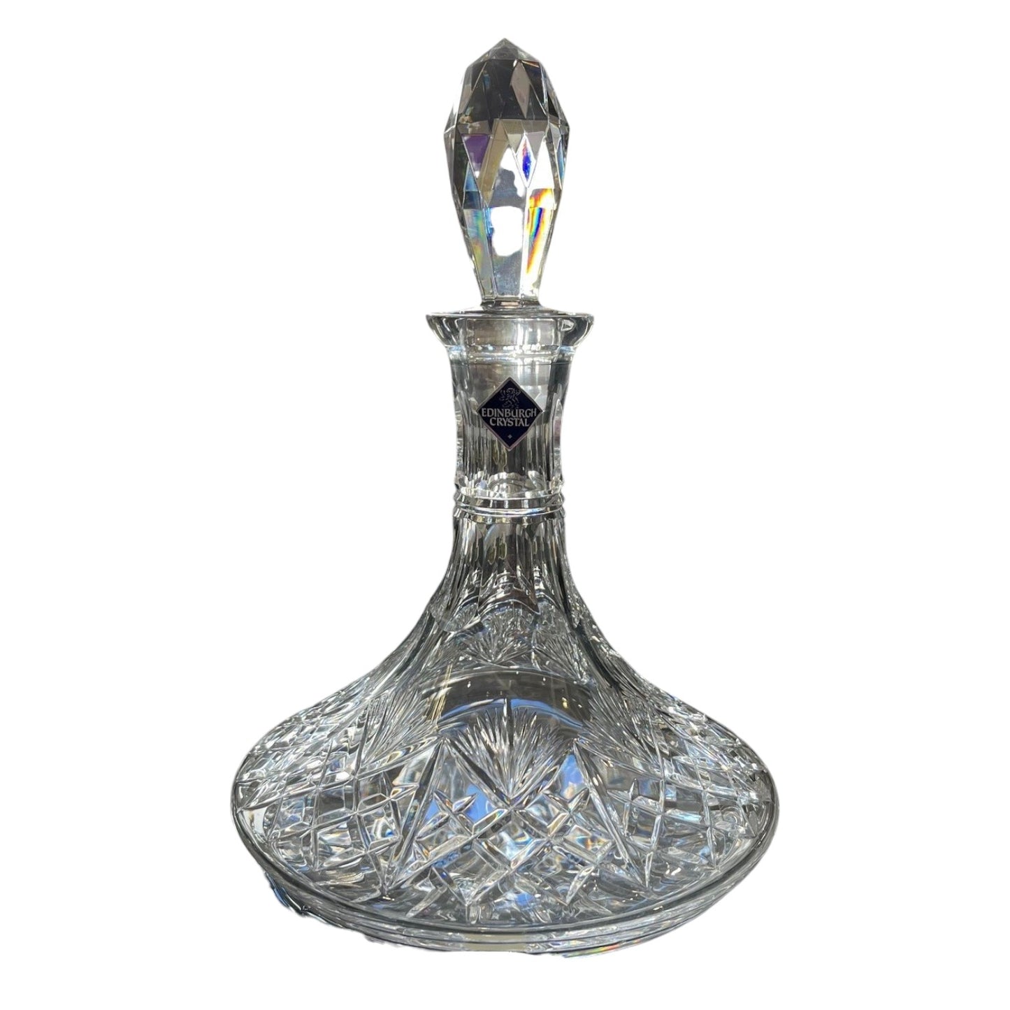 Crystal Edinburgh crystal decanter with a decorative stopper on a white background