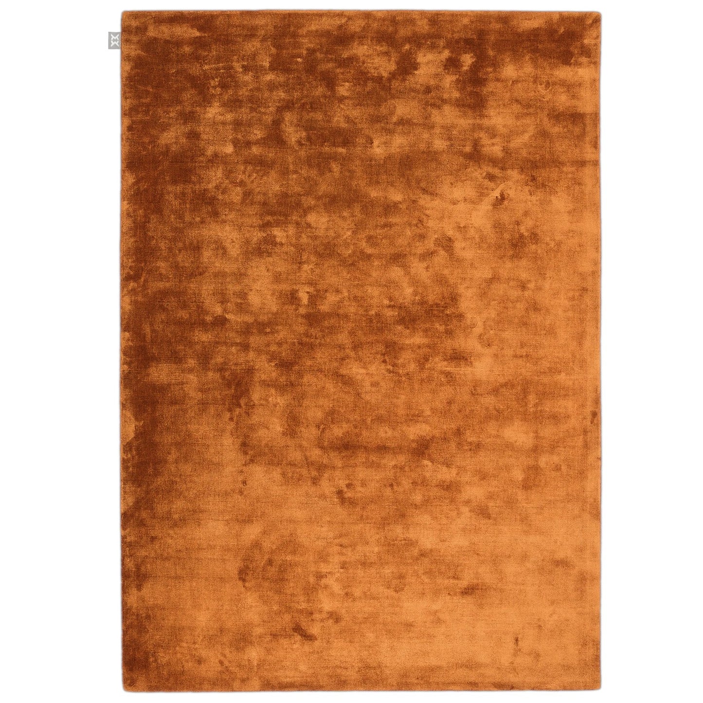copper textured rug on a white background