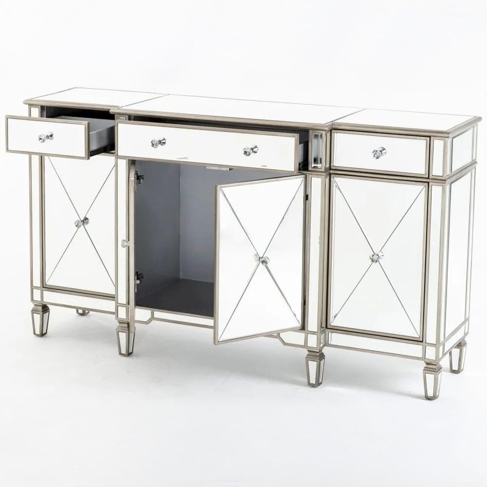 Decorative console table with mirrored panels and silver accents on a white background