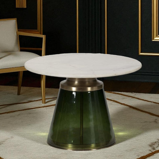 art deco style round table with green base in a stylish room with chairs and wall lights.