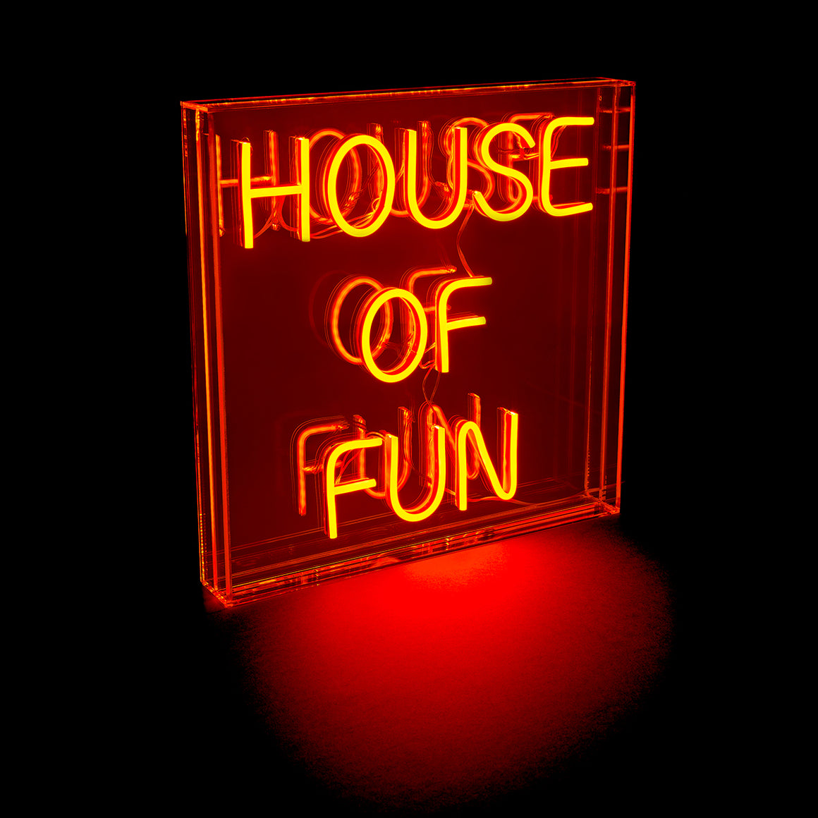 Neon sign with 'HOUSE OF FUN' text on a black background