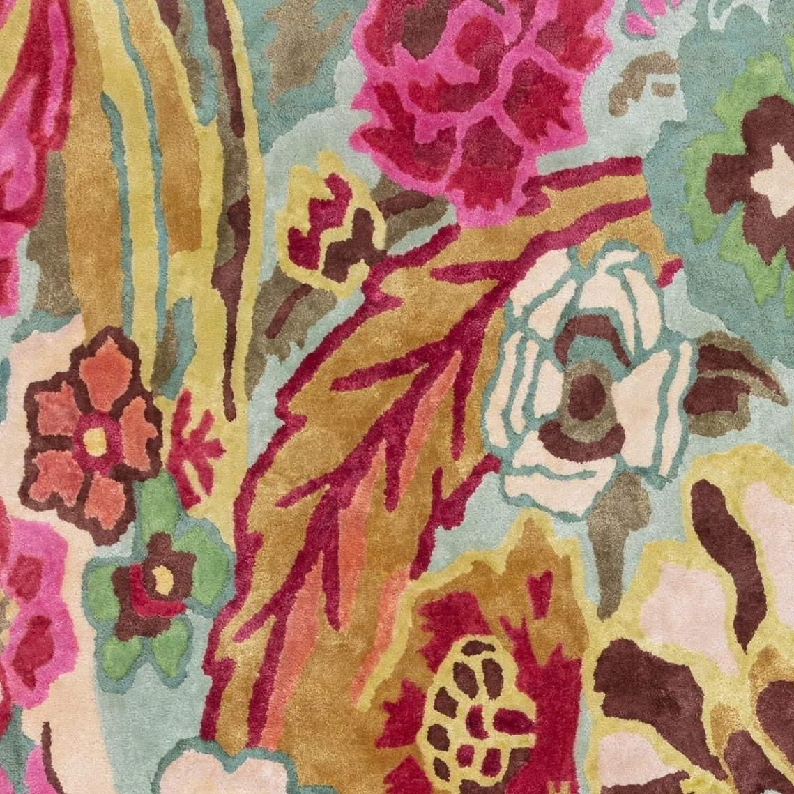 Close-up of a colorful floral-patterned rug with vibrant colors.