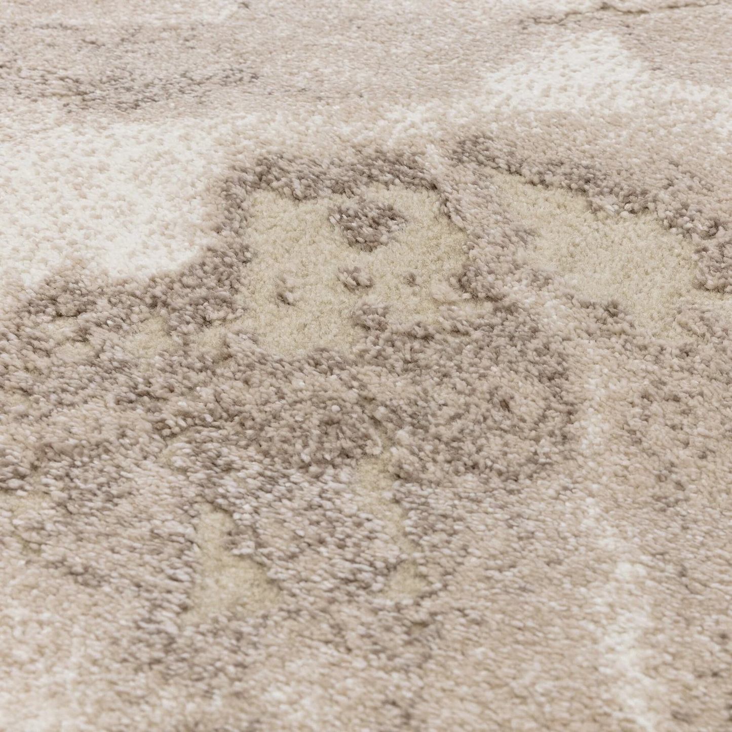 Close-up of a textured beige carpet