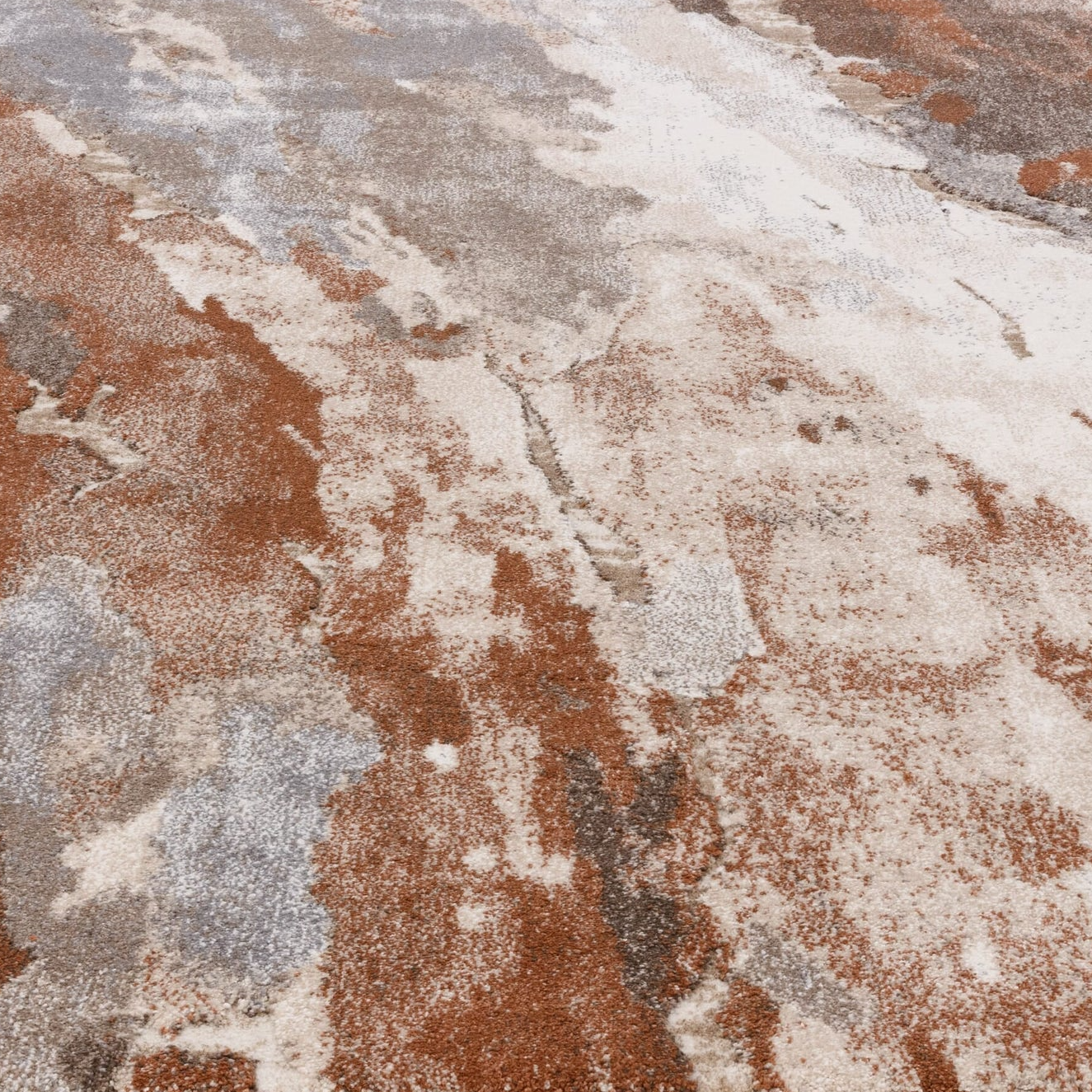 Multicolored area rug with a textured pattern on a white background