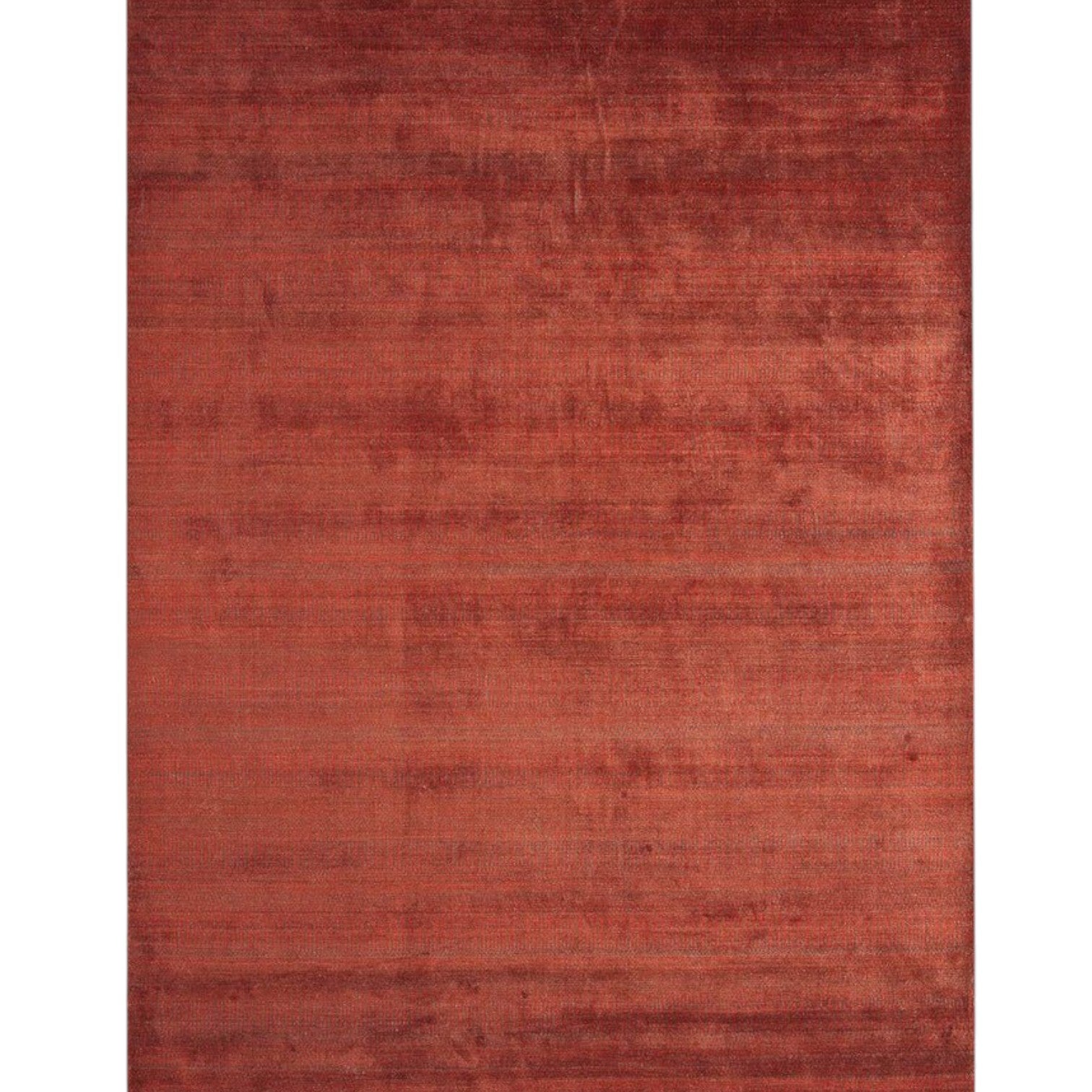 Reddish-brown textured rug on a white background