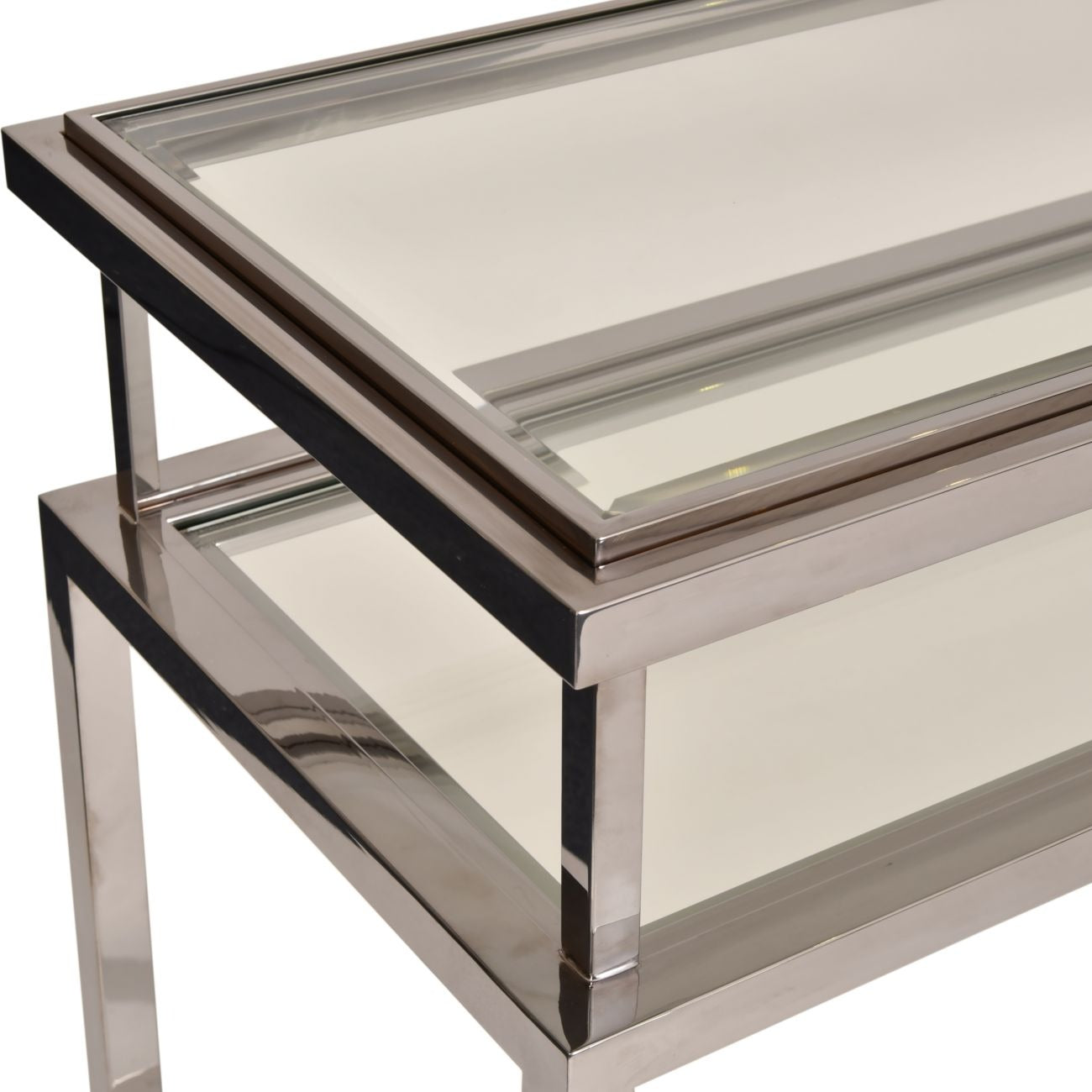 Two glass tables with metal frames on a white background