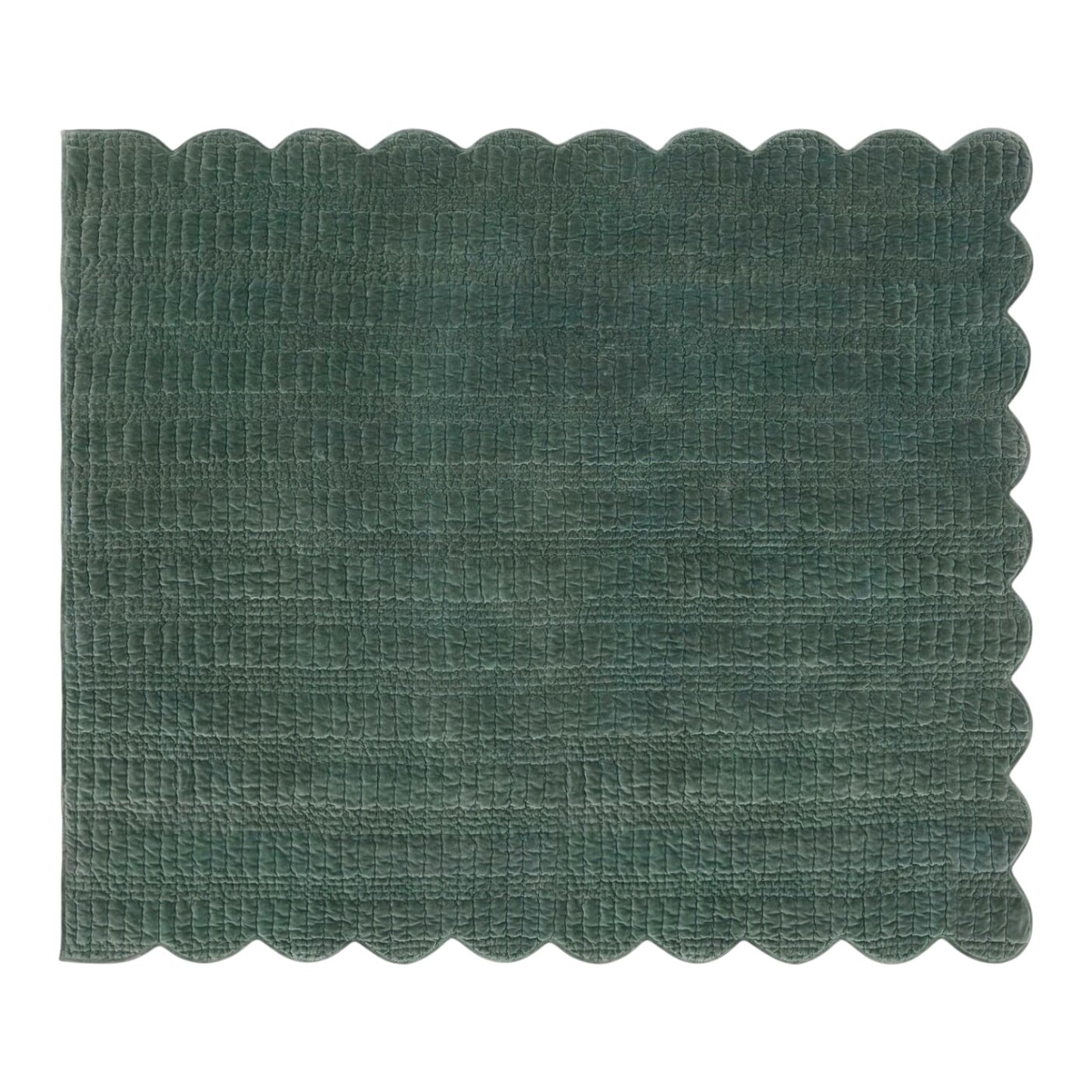 Green scalloped placemat on a white background