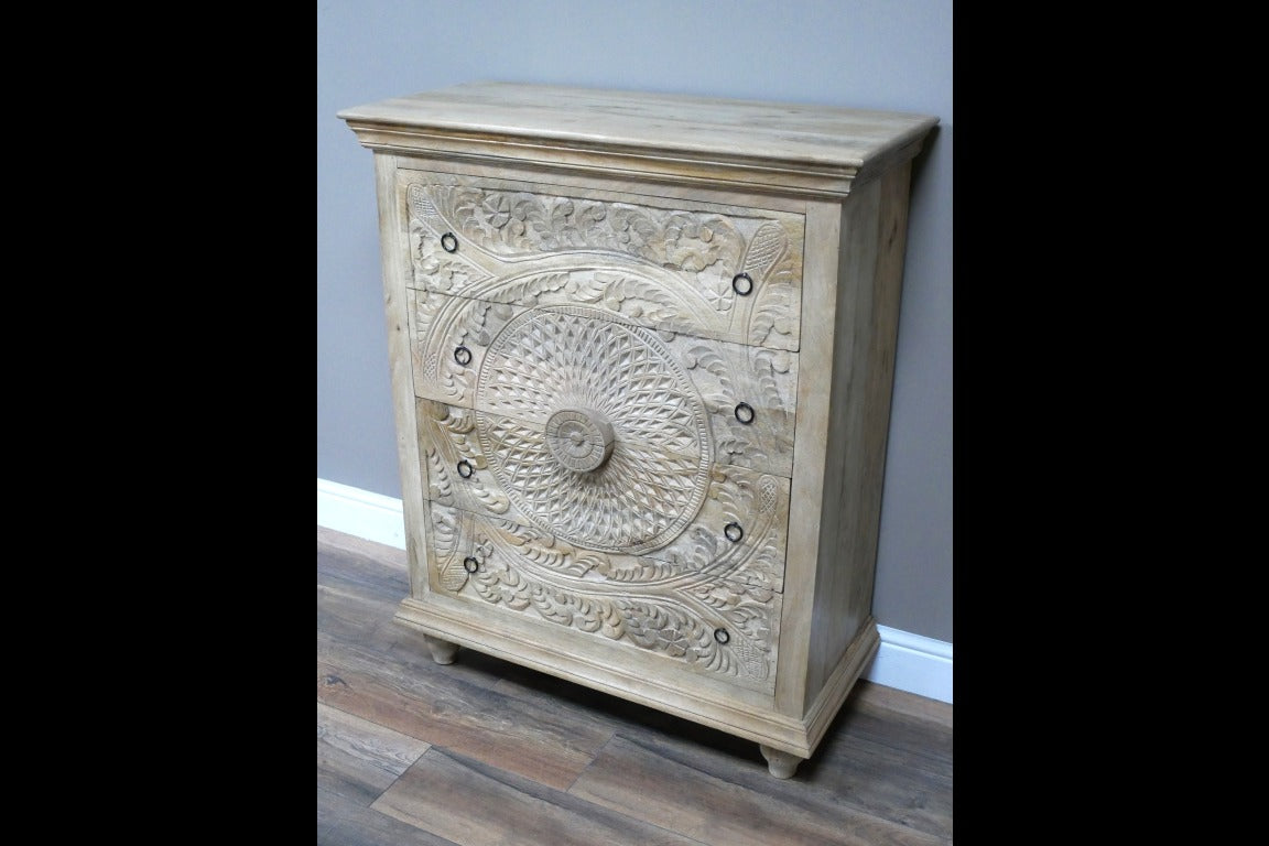 A solid wood chest of drawers measuring 110cm in height, 90cm in width, and 41cm in depth, featuring intricately hand-carved floral and geometric patterns on its drawer fronts. The natural wood finish highlights the detailed craftsmanship, making it a versatile piece suitable for various interior styles, including bohemian, rustic, and moroccan decors.