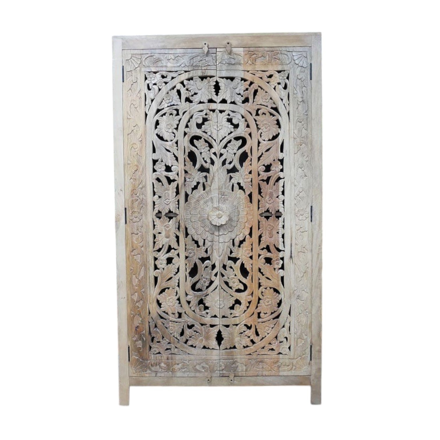 A tall, hand-carved solid mango wood cabinet measuring 180cm in height, 100cm in width, and 40cm in depth. The cabinet features two full-length doors adorned with intricate floral and geometric carvings, reflecting Eastern design influences. Finished in a natural wood tone, this piece offers ample internal storage with shelved compartments, making it both functional and decorative. Suitable for various interior styles, including bohemian, rustic, and eclectic homes.