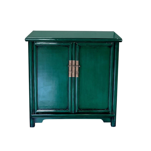 Make a bold statement with the Chinoiserie Large Green Pine Cabinet, a striking piece that infuses your home with the allure of oriental design. Its deep green finish commands attention, while spacious internal shelves offer practical storage. Perfect for those who dare to blend elegance with distinctive style!