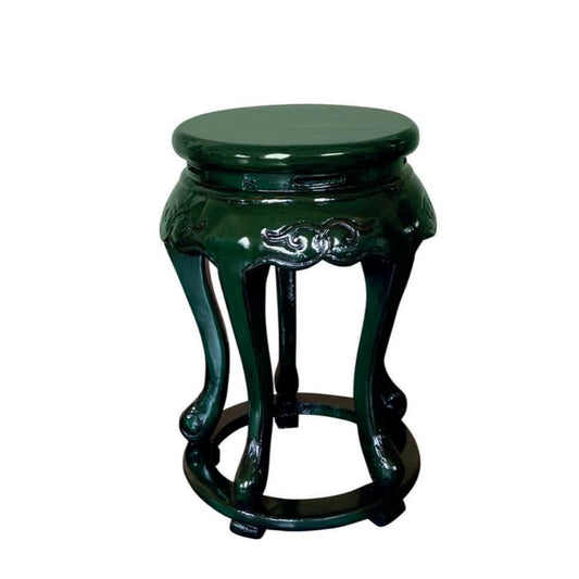 Crafted from exquisite elm wood and finished in a rich, deep green, this Chinoiserie stool commands attention with its bold oriental flair. Its unique design and intricate details transform any room into a statement of daring elegance. Perfect for those who dare to stand out.
