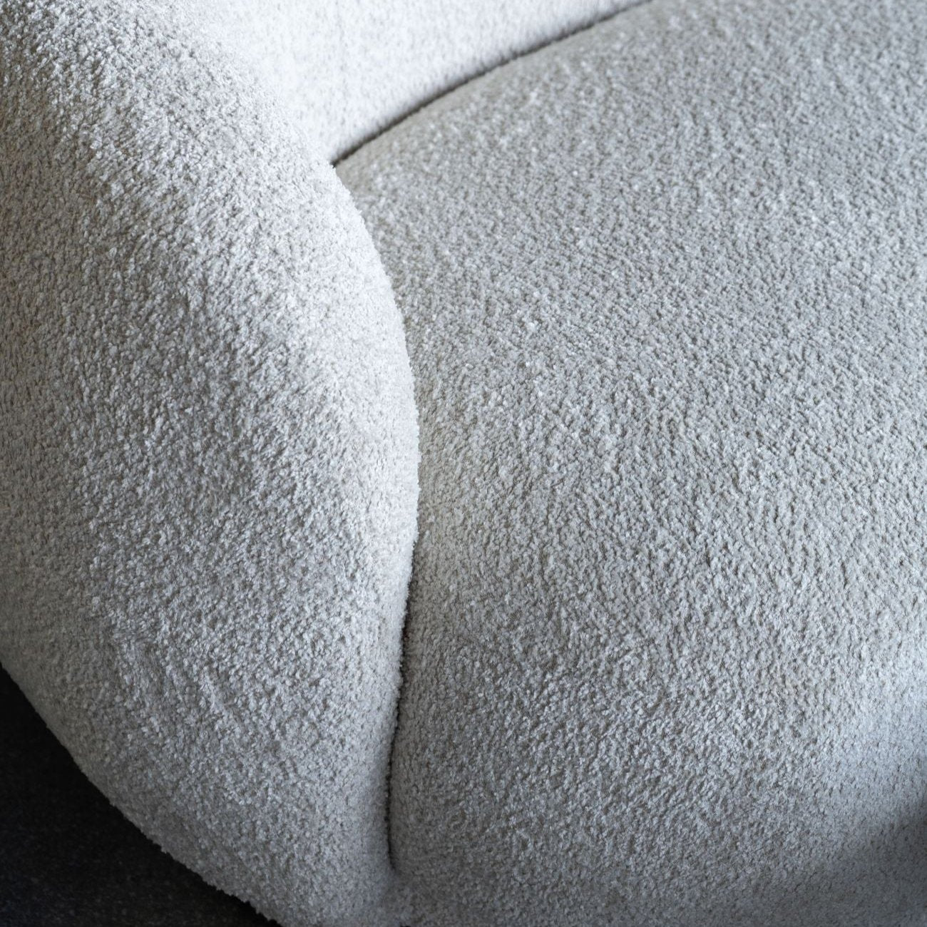 Curved Ivory Boucle Textured Sofa Close Up