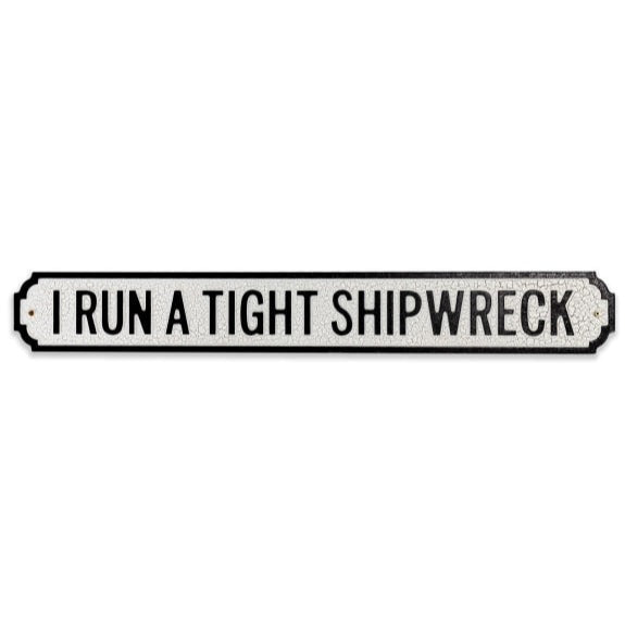 A White Wooden Sign With Black Capital Letters reading 'I Run A Tight Shipwreck', 92.5cm wide and 13.5cm height