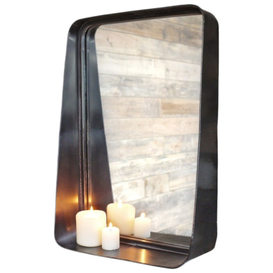 This Industrial Metal Wall Mirror combines style and practicality, perfect for industrial and rustic interiors. Crafted from metal with a dark finish, it adds a sophisticated touch to any room. The small shelf at the bottom offers convenient storage. Its sleek design ensures it complements a variety of decor styles, making it a versatile and functional addition to your home.