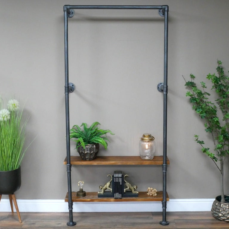 This Industrial Pipe Hallway Shelf goes above and beyond with its bold steel grey metal pipe design, injecting a daring urban vibe into your entryway! Featuring four round fixing plates, it secures firmly to your wall while bringing raw industrial charm. Two rustic reclaimed wood shelves at the base provide practical shoe storage, making this piece both unique and functional. Upgrade your storage game!
1.95 metres tall.