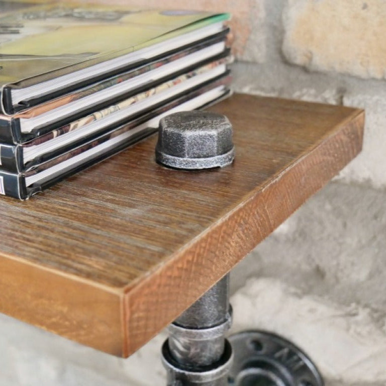 The Industrial Pipe Singular Shelf boldly blends rugged iron pipes with warm, rustic wood for a striking statement piece. Its unique design features a decorative red valve, adding an unexpected pop of colour and industrial flair. Upgrade your walls today with this standout storage choice!