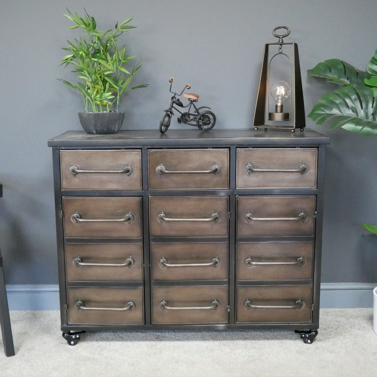 Dare to defy ordinary storage with our Industrial Style Cabinet. This bold metal masterpiece flaunts 3 drawers and 3 cabinets, perfect for rustic and industrial spaces, challenging conventional storage with its unapologetic blend of raw metal charm and sleek styling.