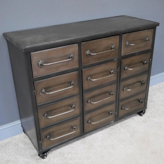 Dare to defy ordinary storage with our Industrial Style Cabinet. This bold metal masterpiece flaunts 3 drawers and 3 cabinets, perfect for rustic and industrial spaces, challenging conventional storage with its unapologetic blend of raw metal charm and sleek styling.