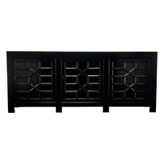 Make a bold statement with the Oriental Black Wood Sideboard. Its large, luxurious design combines classic Eastern style with practical storage, featuring three spacious doors to keep your essentials neatly tucked away. This striking piece transforms any room into a sophisticated sanctuary, adding an exclusive touch of daring elegance to your home.