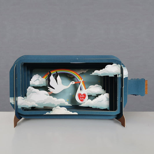 Pop Up New Baby Card, featuring a stork carrying a baby bundle in front of a rainbow