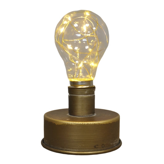 Illuminate your space with the Rustic Brass-Look Bulb Light. Powered by 2 AA batteries, it offers a warm, inviting glow that enhances any room. The industrial-style weathered finish adds a rustic charm, making it a stylish and versatile addition to your decor. Easy to move and place, it helps create a cosy, welcoming atmosphere wherever you choose!
