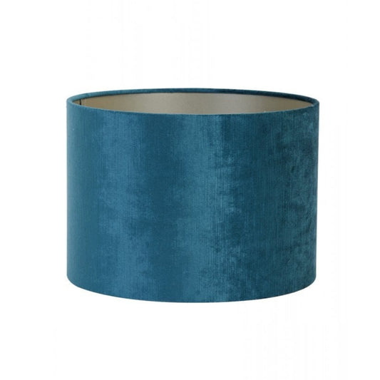a cylindrical lampshade in turquoise blue, perfect for maximalist interiors